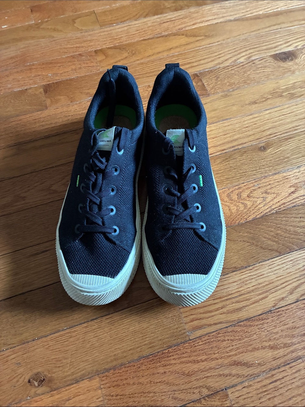 Cariuma Black Canvas Sneakers with Cream Sole and Green Accents